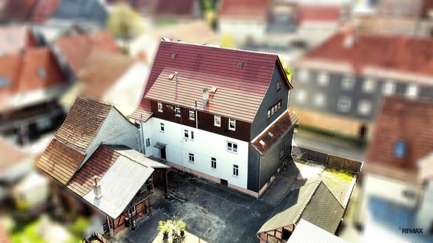 Immobilie in Schalkau - Historisches Mehrfamilienhaus- und Gewerbeobjekt mit großem Grundstück & Entwicklungspotenzial - Bild 1