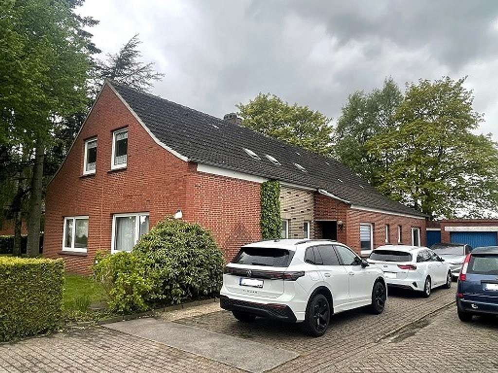 Immobilie in Moormerland - Großzügiges Zweifamilienhaus mit Ausbaureserven in Moormerland-Neermoor - Bild 0
