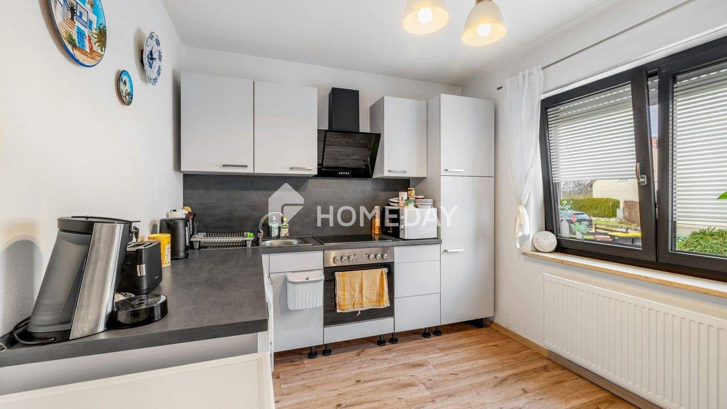 Immobilie in Manching - Helle, modernisierte Wohnung mit durchdachtem Grundriss und gepflegtem Umfeld - Bild 4