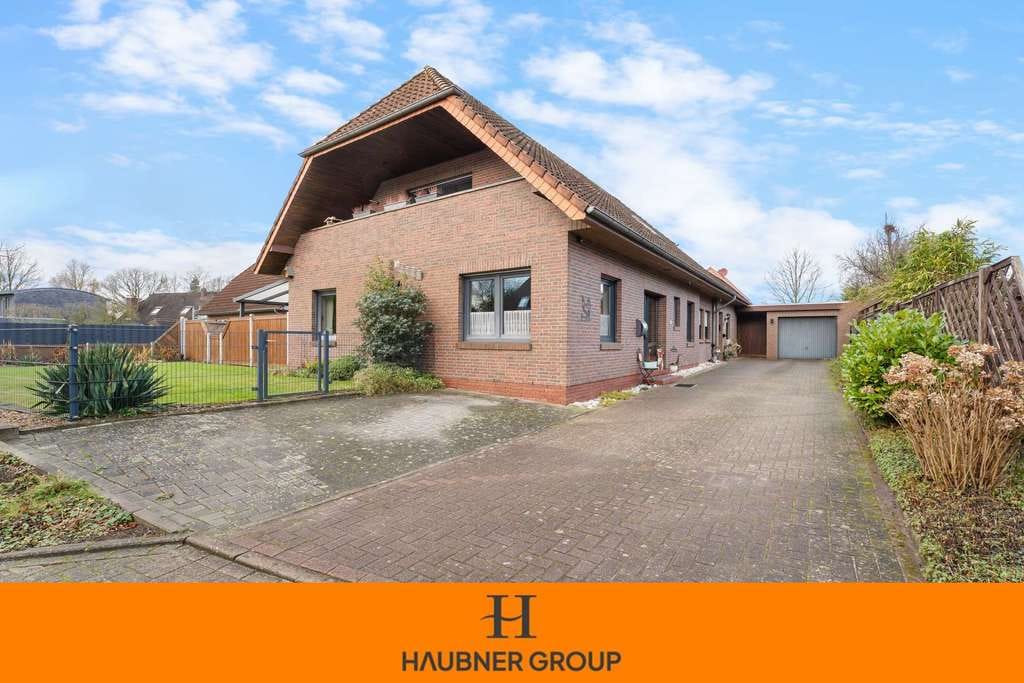 Immobilie in Wiefelstede - Familientraum mit Perspektive: Großzügiges Einfamilienhaus plus rentable Einliegerwohnung - Bild 0