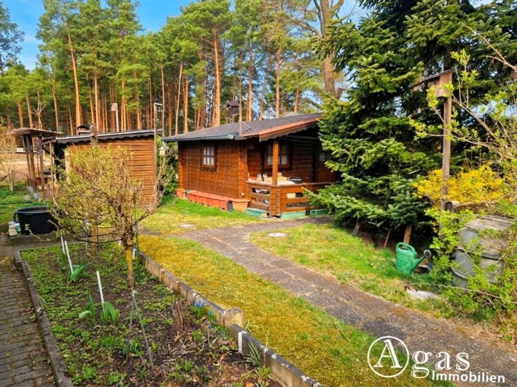 Immobilie in Brieskow-Finkenheerd - Erholung pur: Freizeitbungalow mit Holzblockhaus in Bungalowsiedlung und Kanalblick - Bild 2