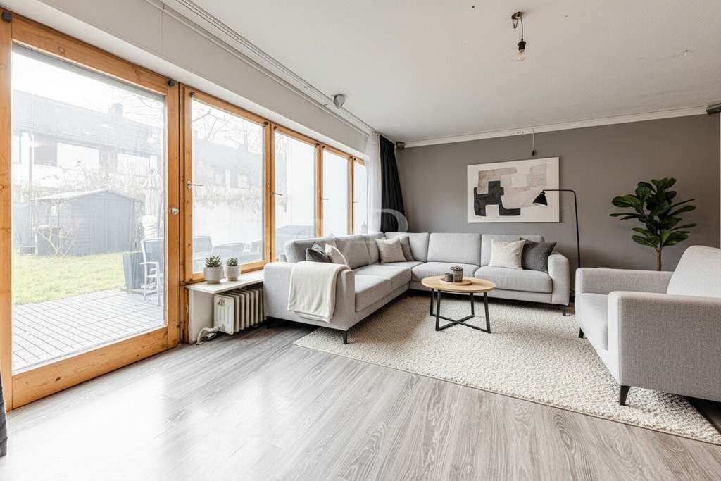 Immobilie in Hohenbrunn - Renovierungsbedürftiges Reihenmittelhaus mit großem Potenzial - Bild 1