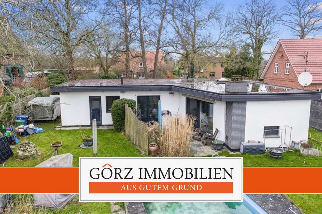 Immobilie in Hüttblek - ***Schöner Winkelbungalow mit Pool und Doppelgarage in Feldrandlage!*** - Bild 0
