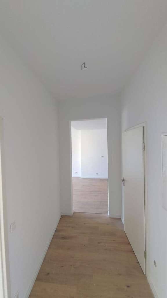 Immobilie in Bellheim - Kernsaniert & bezugsfertig - moderne 4-Zimmer-Wohnung mit Balkon in Bellheim - Bild 0