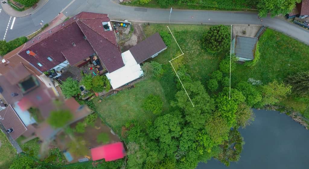 Immobilie in Herzberg am Harz - Voll vermietetes Mehrfamilienhaus mit Garagen, Scheune, viel Nutzfläche & zusätzlichem Baugrundst� - Bild 2