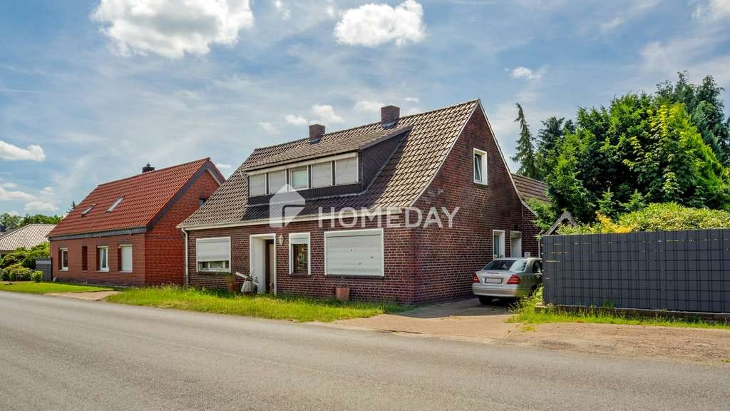 Immobilie in Twistringen - Charmantes Einfamilienhaus in Twistringen-Scharrendorf mit Garten und Potenzial - Bild 0
