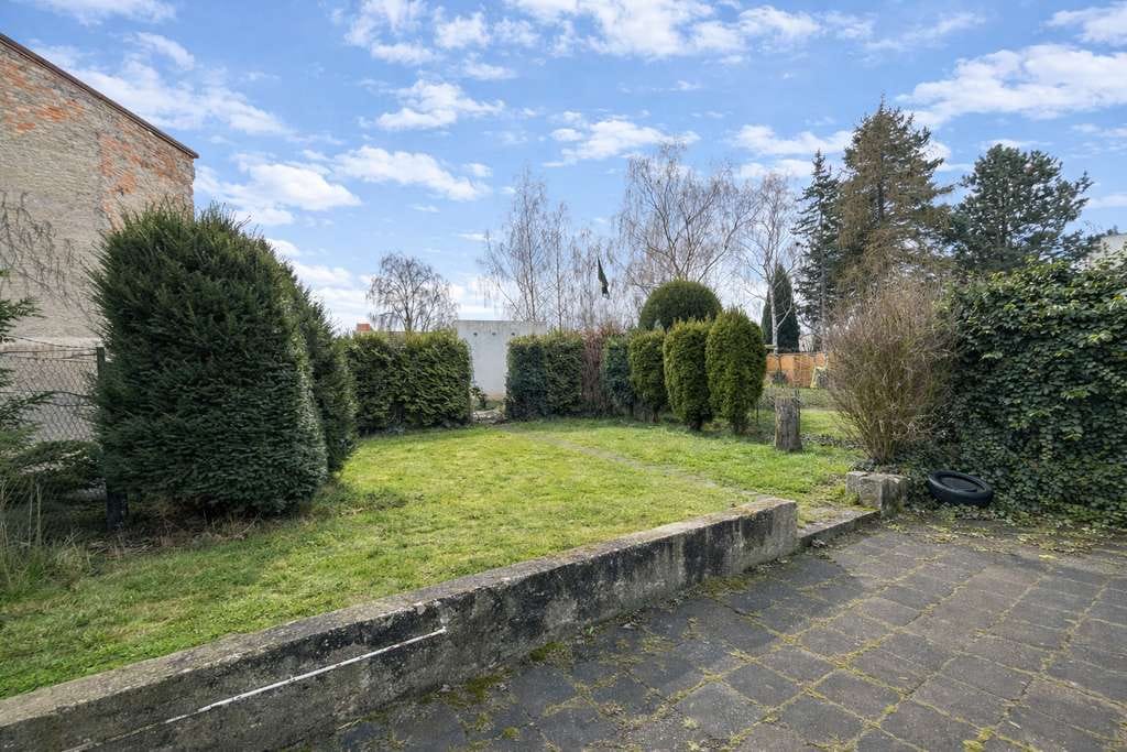 Immobilie in Hohenmölsen - Solides Reihenmittelhaus mit Modernisierungspotenzial und sonnigem Südgarten - Bild 3