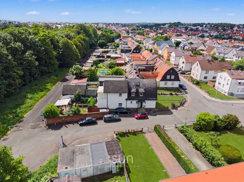 Immobilie in Wölfersheim - WO DER GARTEN DEN WALD INS HAUS HOLT! - Leben in erster Reihe zum Wölfersheimer See - Bild 0