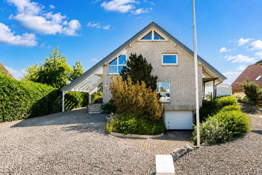 Immobilie in Langballig - Ringsberg: Einfamilienhaus mit Einliegerwohnung zum Ankommen, Durchatmen und Bleiben - Bild 1