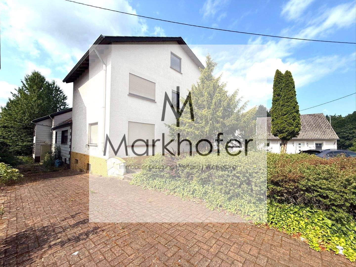 Immobilie in Bexbach - Einfamilienhaus mit zusätzlichem Baugrund in Bexbach - großes Potenzial für Eigennutzer & Investoren - Bild 0