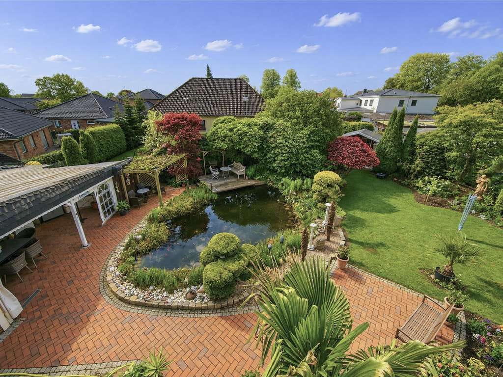 Immobilie in Hohenlockstedt - Zwischen Gartenidylle und Wohnkomfort – Großzügiges Ein-/Zweifamilienhaus auf 1.176 m² Traumgrundstü - Bild 3
