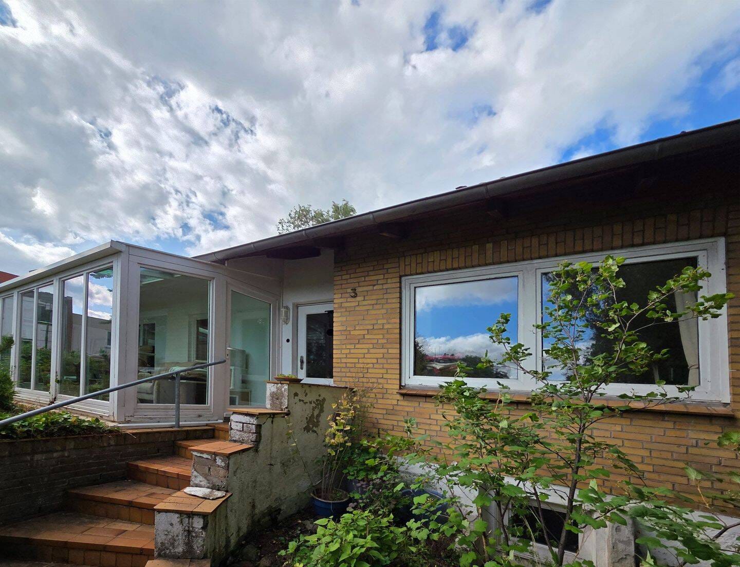 Immobilie in Lütjenburg - Charmantes Haus in grüner Oase mit Ruhe und Fernblick - Bild 1