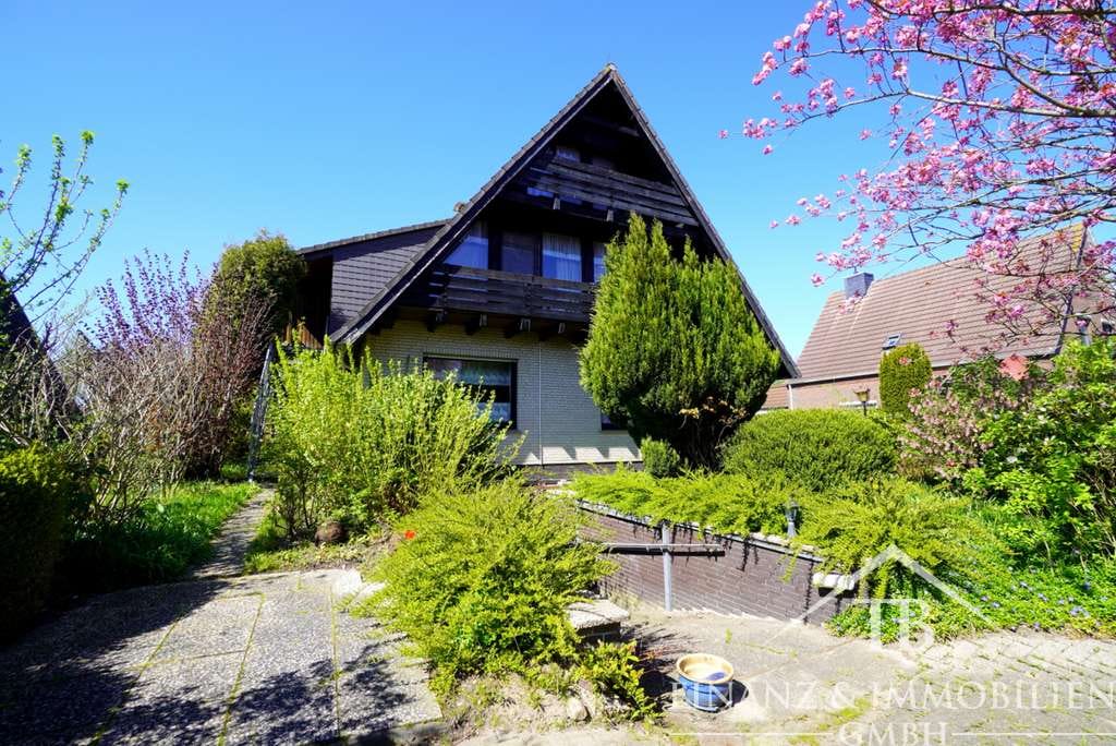 Immobilie in Holtgast - Holtgast: Raumwunder mit Tiefgarage - Einfamilienhaus mit 2 Wohneinheiten! #130 - Bild 1