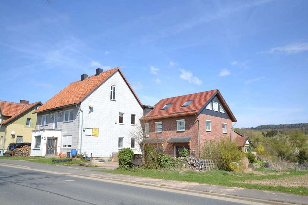 Immobilie in Eimen - Fachwerkhaus mit ausgebauter Scheune in 37632 Mainzholzen - Bild 4