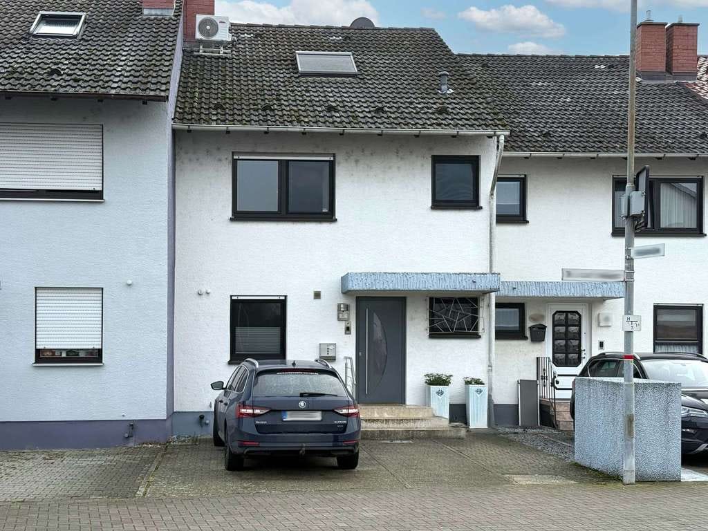 Immobilie in Ketsch - Gepflegtes Reihenmittelhaus mit Garten, Garage und Ausbaupotenzial in Ketsch - Bild 1