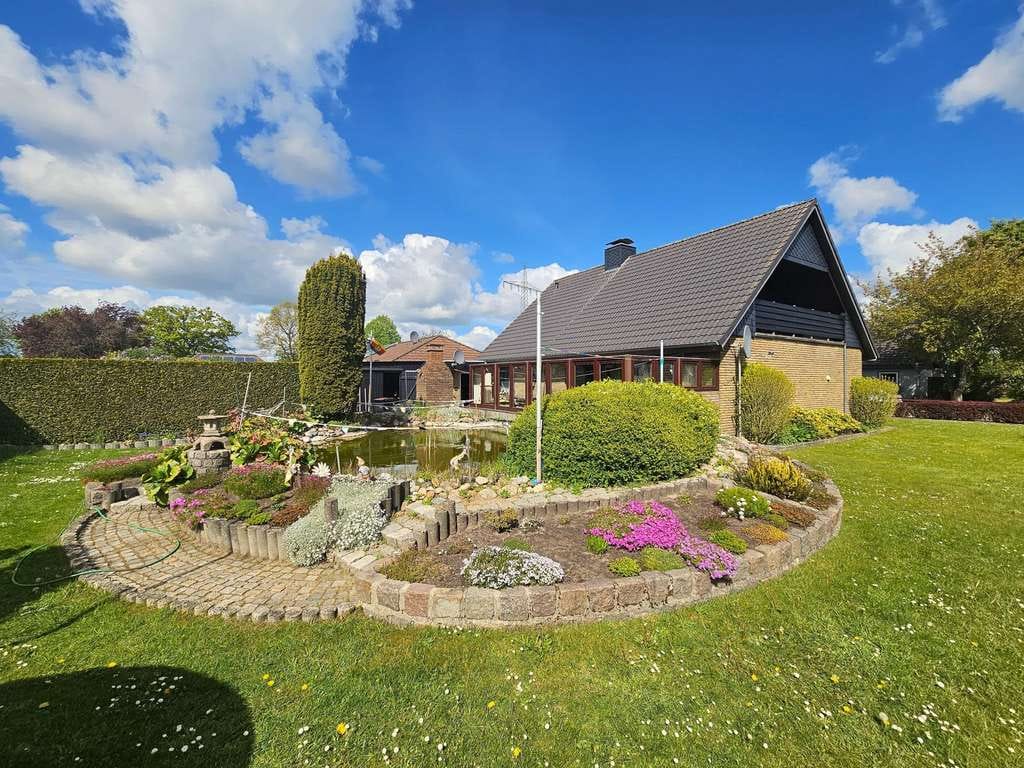 Immobilie in Bollingstedt - Großzügiges Einfamilienhaus mit Traumgrundstück, Sauna & XXL-Garage - Bild 0