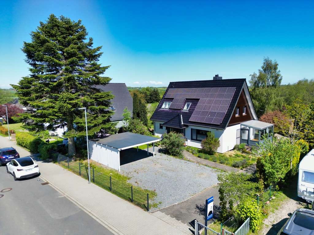 Immobilie in Süderbrarup - Modernisiertes Einfamilienhaus mit Wintergarten, Kaminofen, PV und viel Platz in ruhiger Lage. Top! - Bild 1