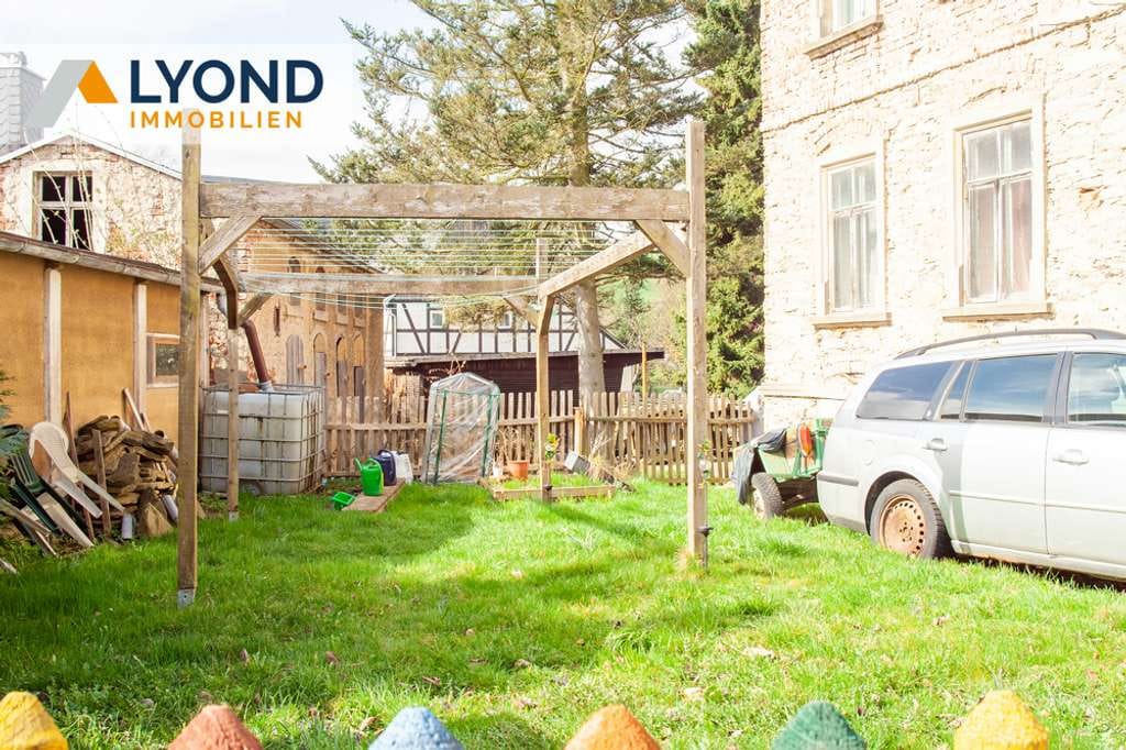 Immobilie in Grünhainichen - Charmantes Mehrfamilienhaus mit großem Grundstück und Ausbaupotenzial - Bild 3