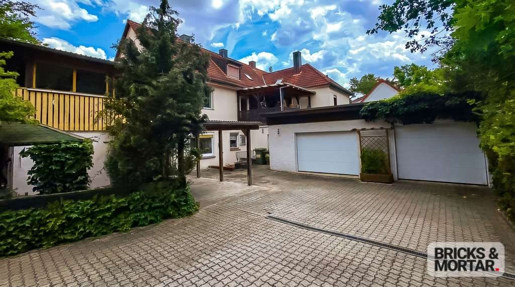 Immobilie in Roth - Gepflegte Doppelhaushälfte mit Einliegerwohnung in Roth - Bild 1