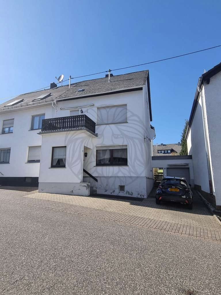Immobilie in Montabaur - MT-Eschelbach: Einfamilienhaus (DHH) mit Garage und schönem Garten - Bild 0