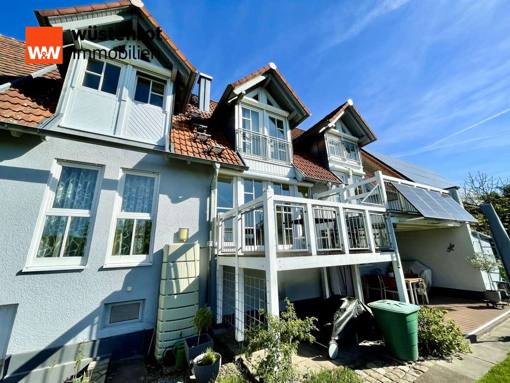 Immobilie in Ötigheim - *EINFAMILIENHAUS MIT BESONDERER ARCHITEKTUR: Tolle Aufteilung mit Garten, 2 Balkone, Garage, u.v.m.* - Bild 1