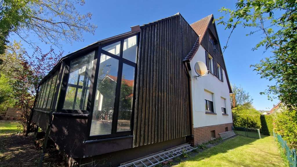 Immobilie in Hasbergen - Idyllisches Ein- Zweifamilienhaus mit großem Potenzial in zentraler Lage von Hasbergen  - Bild 1