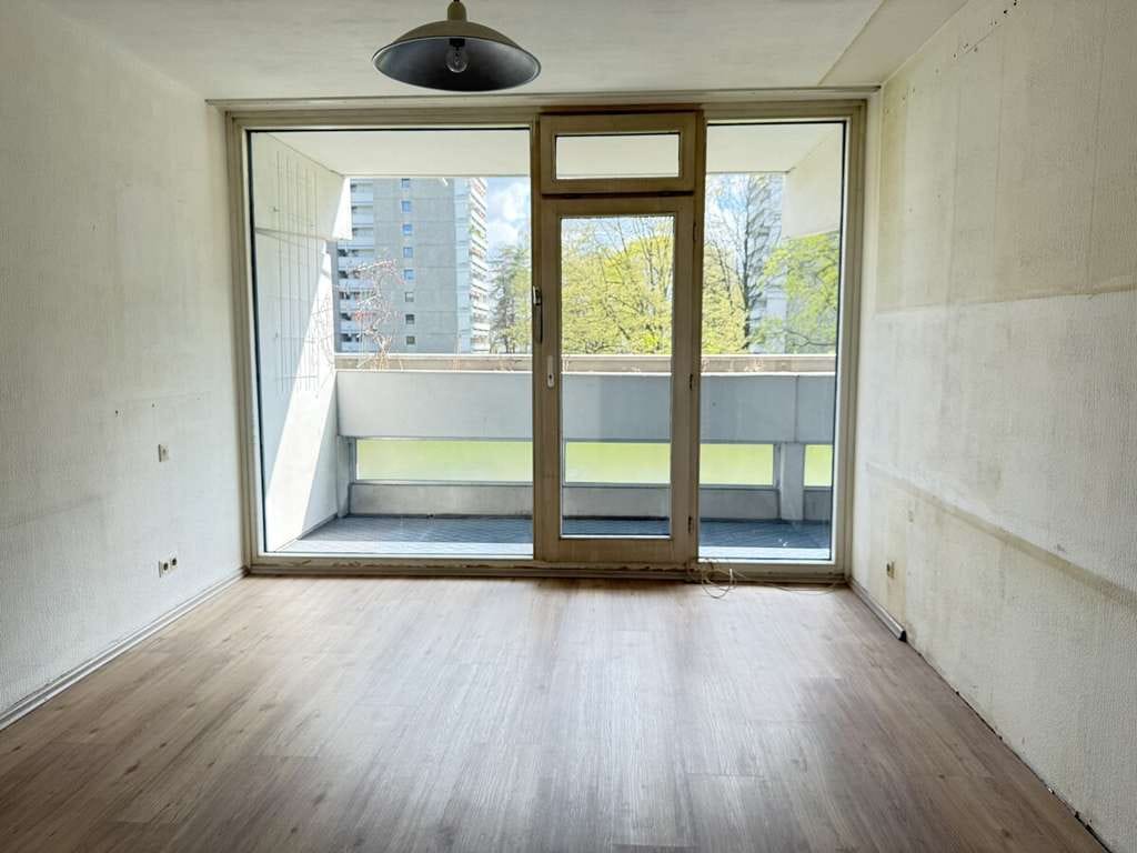 Immobilie in Taufkirchen - Viel Raum zum Leben: 4 Zimmer mit großzügigem Südbalkon & West-Loggia - Bild 4