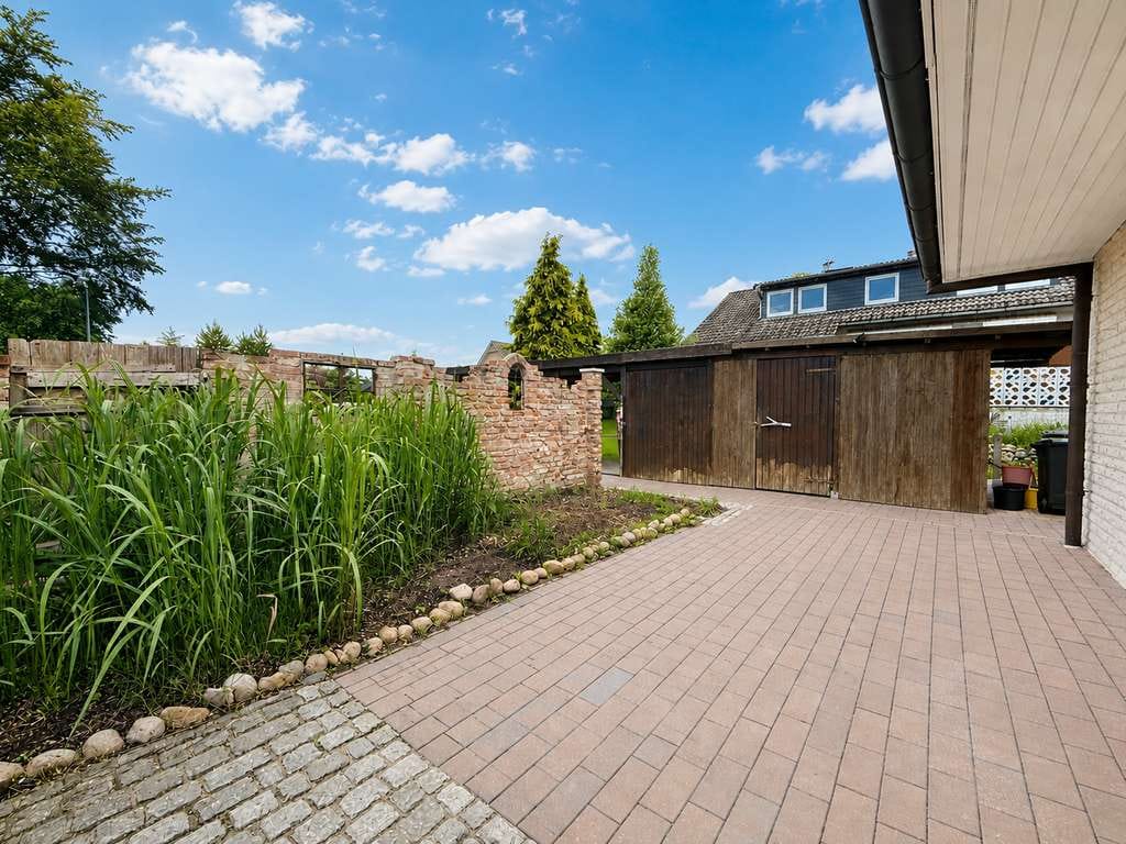 Immobilie in Gyhum - Familienfreundliche Doppelhaushälfte mit großem Garten in ruhiger Wohnlage - Bild 2