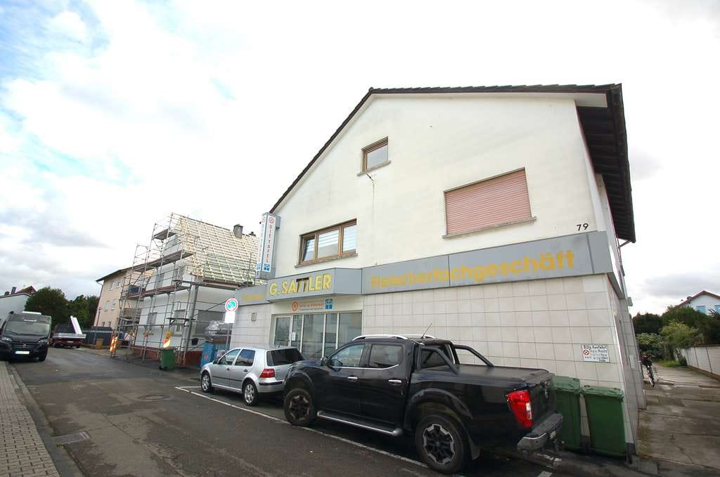 Immobilie in Bürstadt - Mehrfamilienhaus mit Ladengeschäft in ruhiger und beliebter Lage - Bild 0