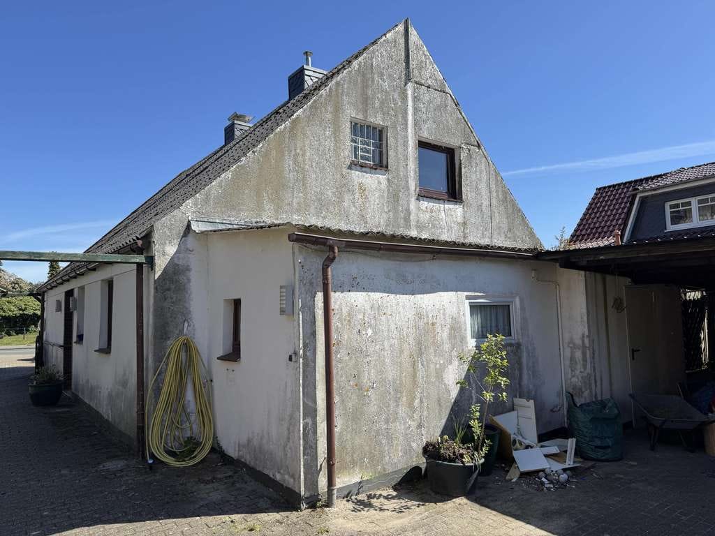 Immobilie in Wurster Nordseeküste - Siedlungshaus mit Anbau und 2 Garagen - Bild 2