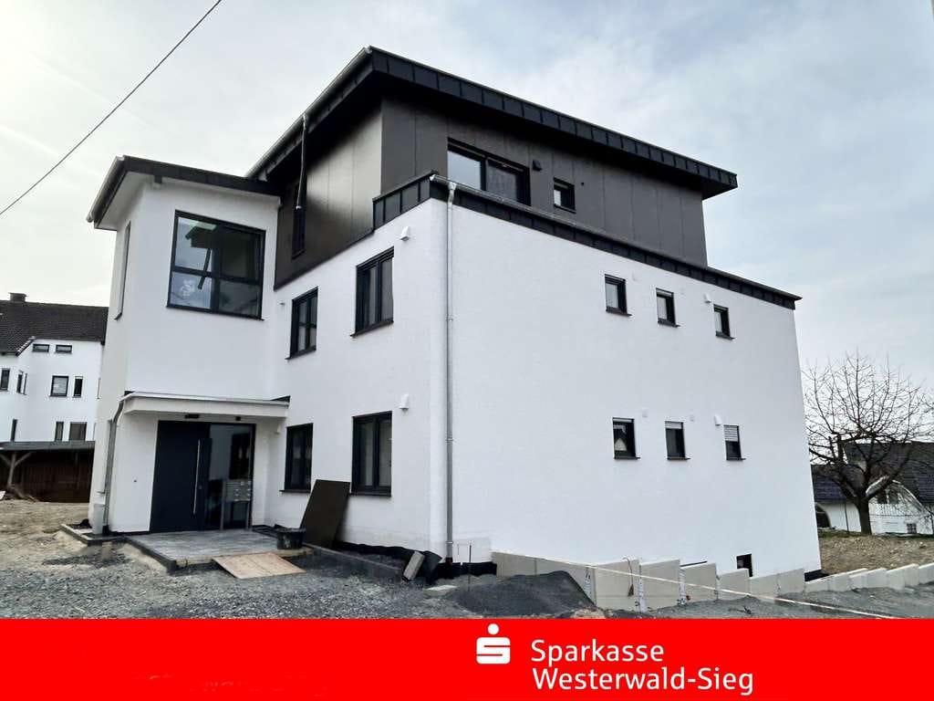 Immobilie in Horhausen (Westerwald) - Horhausen, Souterrain-Eigentumswohnung, Erstbezug, Rollstuhl geeignet, Aufzug,    - Bild 0