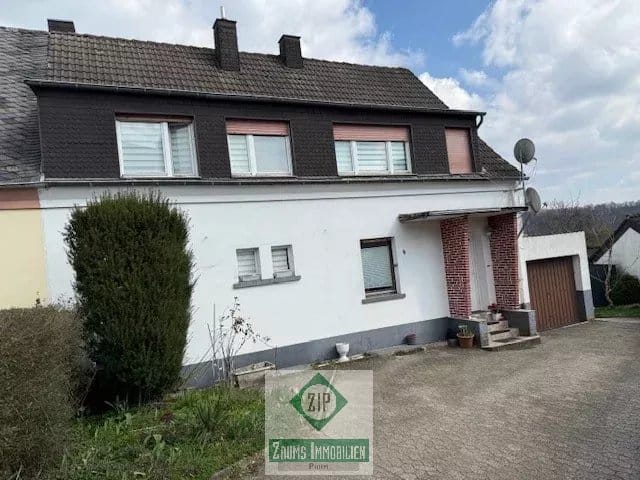 Immobilie in Prüm - Einfamilien-Reihenendhaus in zentraler Lage mit unverbaubarem Fernblick und Garage in Prüm - Bild 0