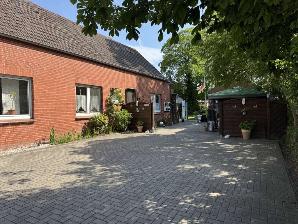 Immobilie in Krummhörn - Attraktives Wohn- und Geschäftshaus  – Investition mit Potenzial - Bild 1