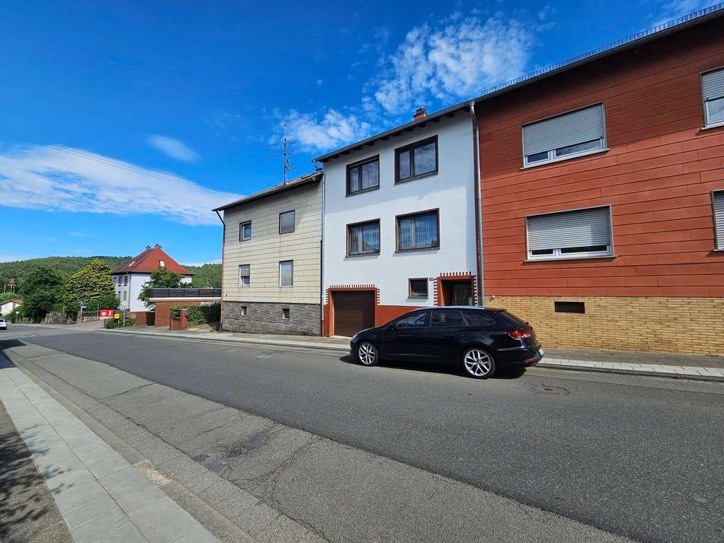 Immobilie in Queidersbach - Bezahlbares Reihenhaus mit Garage und Garten in Queidersbach - Bild 1