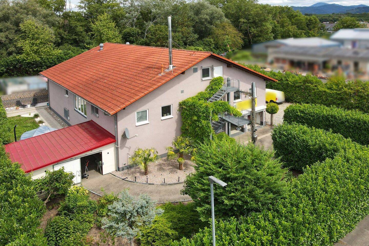Immobilie in Buggingen - Vielseitiges Wohn- und Geschäftshaus in Buggingen – stilvoll wohnen und arbeiten unter einem Dach - Bild 0