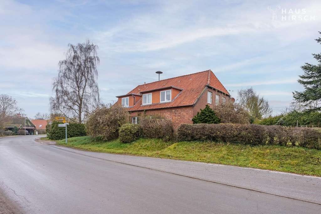 Immobilie in Stockelsdorf - Investoren aufgepasst! - Spannendes Mehrfamilienhaus mit Entwicklungspotential - Bild 1