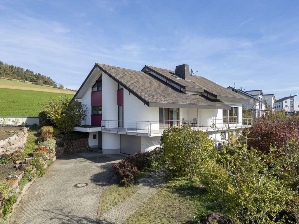 Immobilie in Tengen - Einfamilienhaus mit Wintergarten, Kamin und Naturblick am Luftkurort - Bild 0