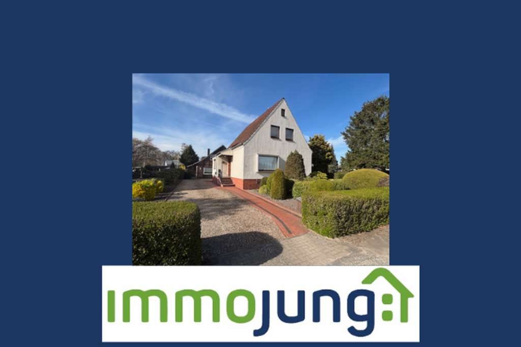 Immobilie in Grasberg - Einfamilienhaus mit zusätzlichem Nebengebäude und großzügigem Garten in zentraler Lage von Grasberg - Bild 0