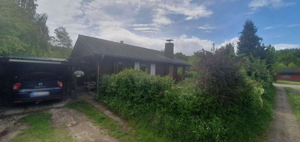 Immobilie in Brekendorf - Dänisches Blockbohlenhaus mit modernem Wohlfühlfaktor in Brekendorf - Bild 1