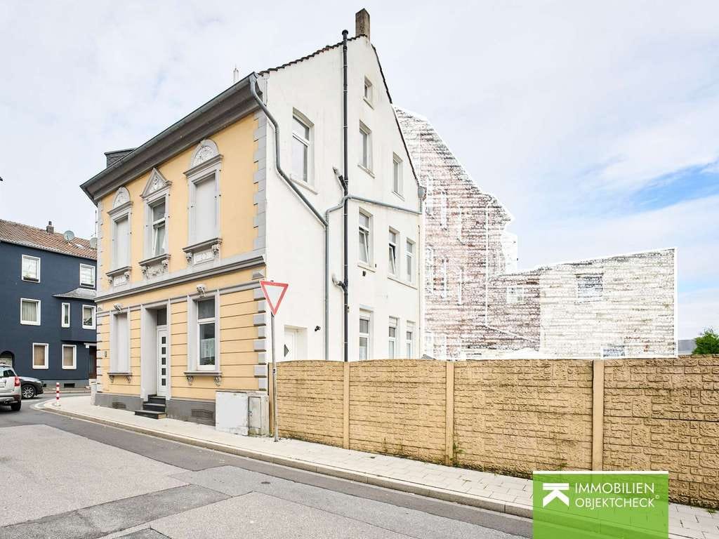 Immobilie in Velbert - Mehrfamilienhaus in der Oberstadt! Drei Wohneinheiten, drei Garagen, gute Perspektiven - Bild 1