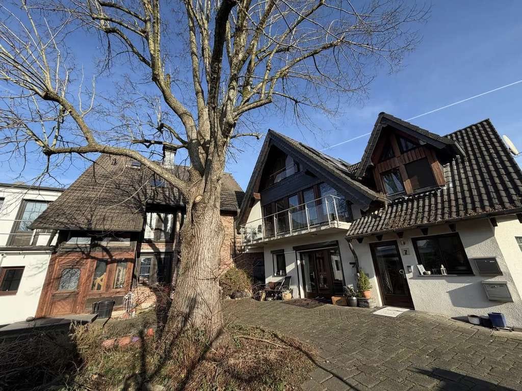 Immobilie in Overath - 2 Ein- oder Mehrfamilienhäuser mit 3 separaten Wohneinheiten - Bild 1