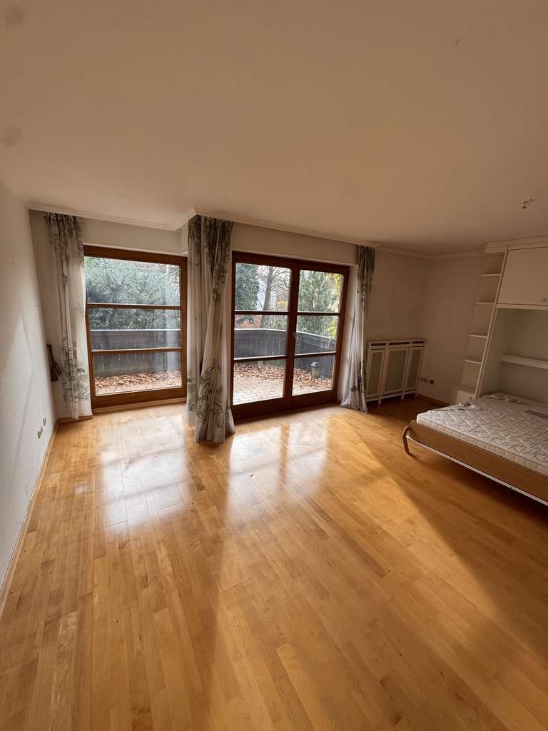 Immobilie in Pullach im Isartal - Helle 1-Zimmer Wohnung mit Balkon im 1. OG in Pullach direkt am Marktplatz  - Bild 1