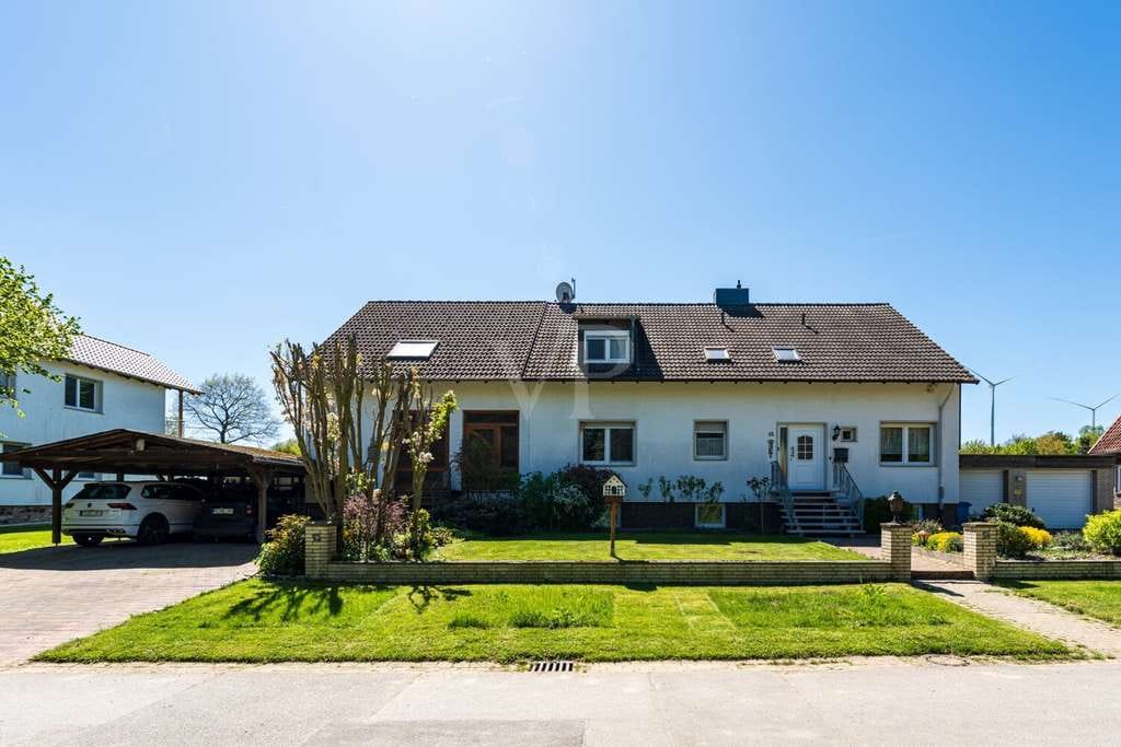 Immobilie in Groß Twülpstedt - AUSREICHEND PLATZ FÜR SIE UND IHRE LIEBEN - ZWEIFAMILIENHAUS IN IDYLLISCHER FELDRANDLAGE - Bild 2