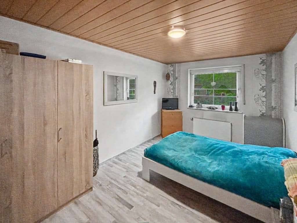 Immobilie in Reken - Familienfreundliches Einfamilienhaus mit Garten und Garage in ruhiger Lage von Reken - Bild 4