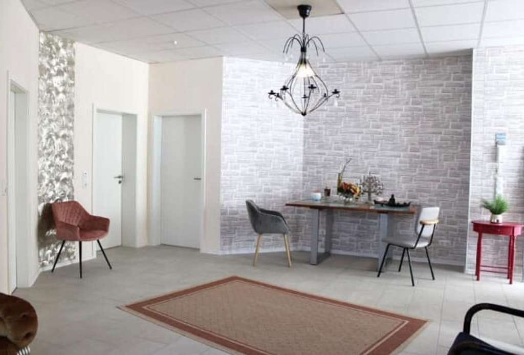 Immobilie in Eich - Loftflair trifft Wohnkomfort – Exklusive Souterrainwohnung mit vielseitigen Nutzungsmöglichkeiten mi - Bild 0