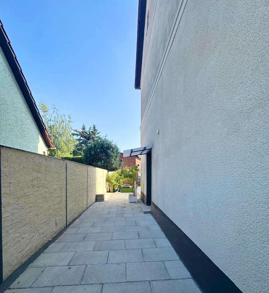 Immobilie in Wittenberge - Charmantes Wohnen auf drei Ebenen – modernisiertes Einfamilienhaus in ruhiger Seitenstraße - Bild 2