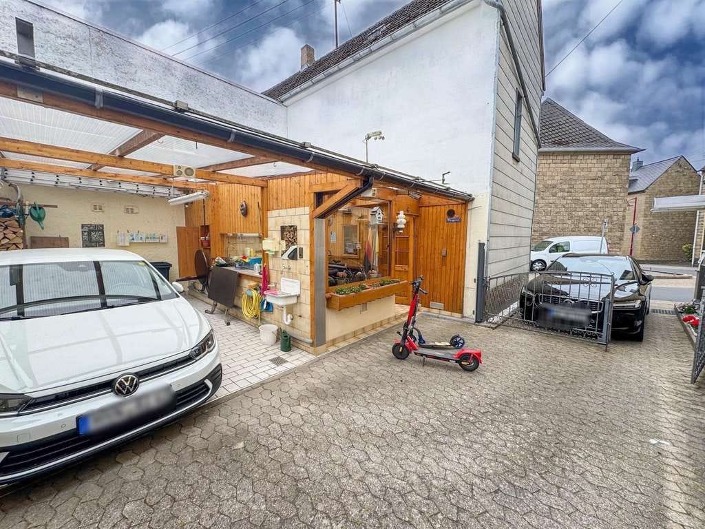 Immobilie in Ettringen - Gepflegtes und renoviertes Zweifamilienhaus in Ettringen  - Bild 2