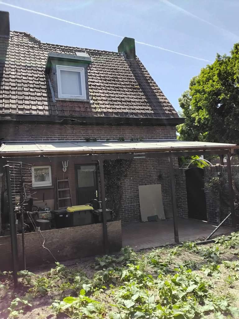 Immobilie in Gronau - Charmantes, vermietetes, teilweise renoviertes und modernisiertes Reihenendhaus mit Garage - Bild 3