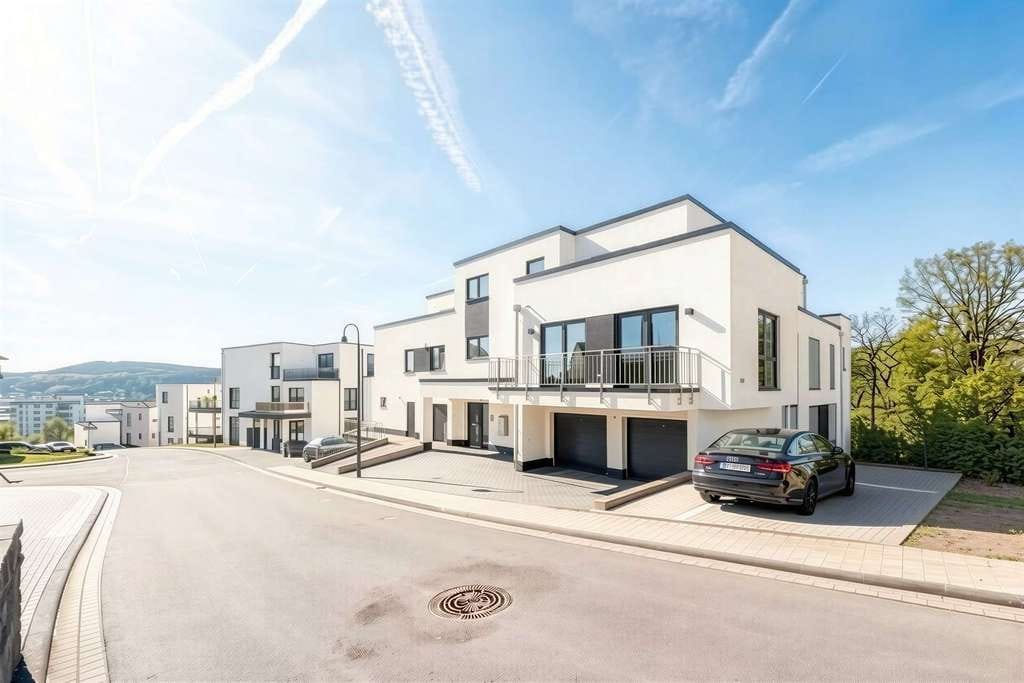 Immobilie in Kenn - Kenn: Luxuriöse und barrierefreie Neubauwohnung mit hochwertiger Ausstattung und zwei Stellplätzen - Bild 2