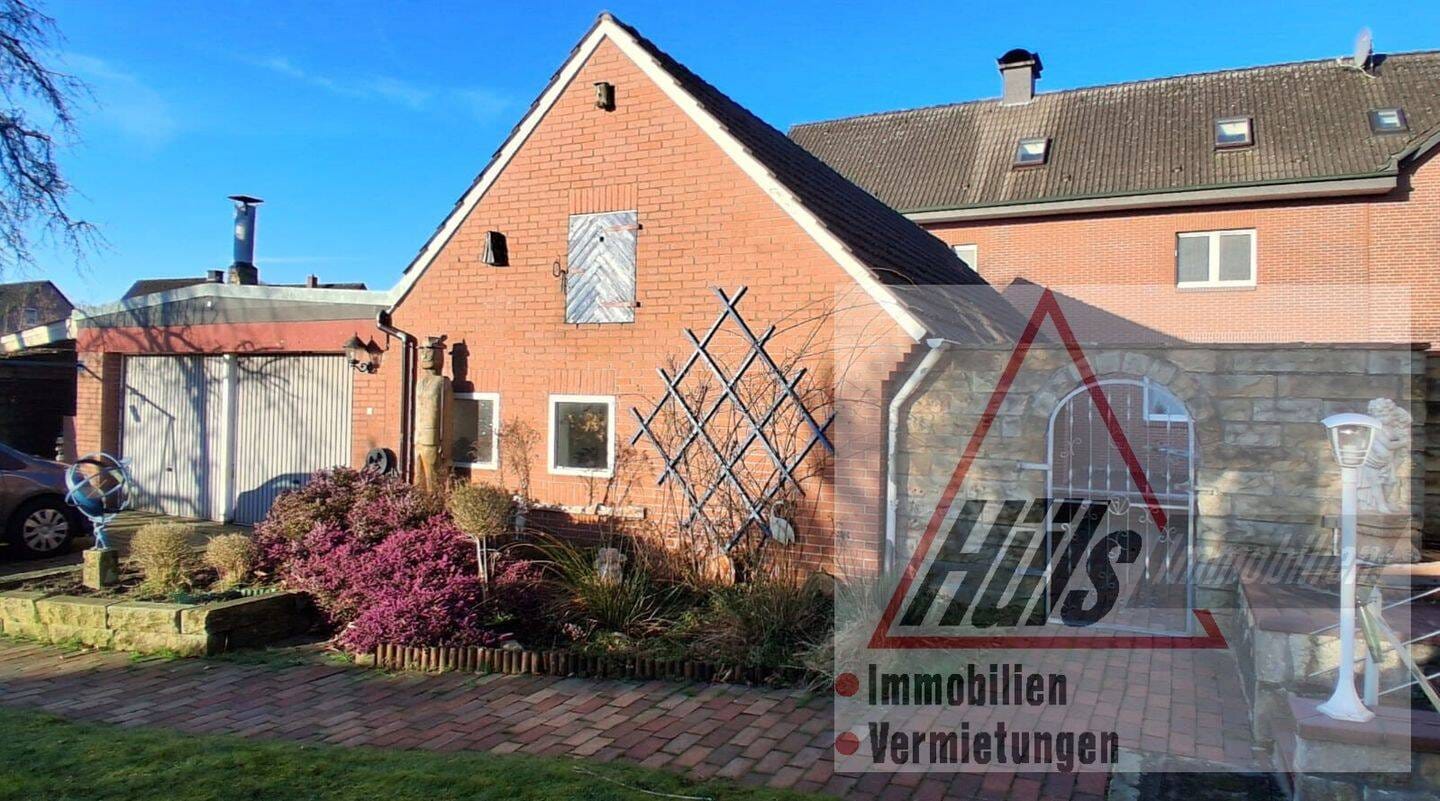 Immobilie in Lienen - Attraktives Dreifamilienhaus mit großem Südgarten und vielen Möglichkeiten - Bild 1